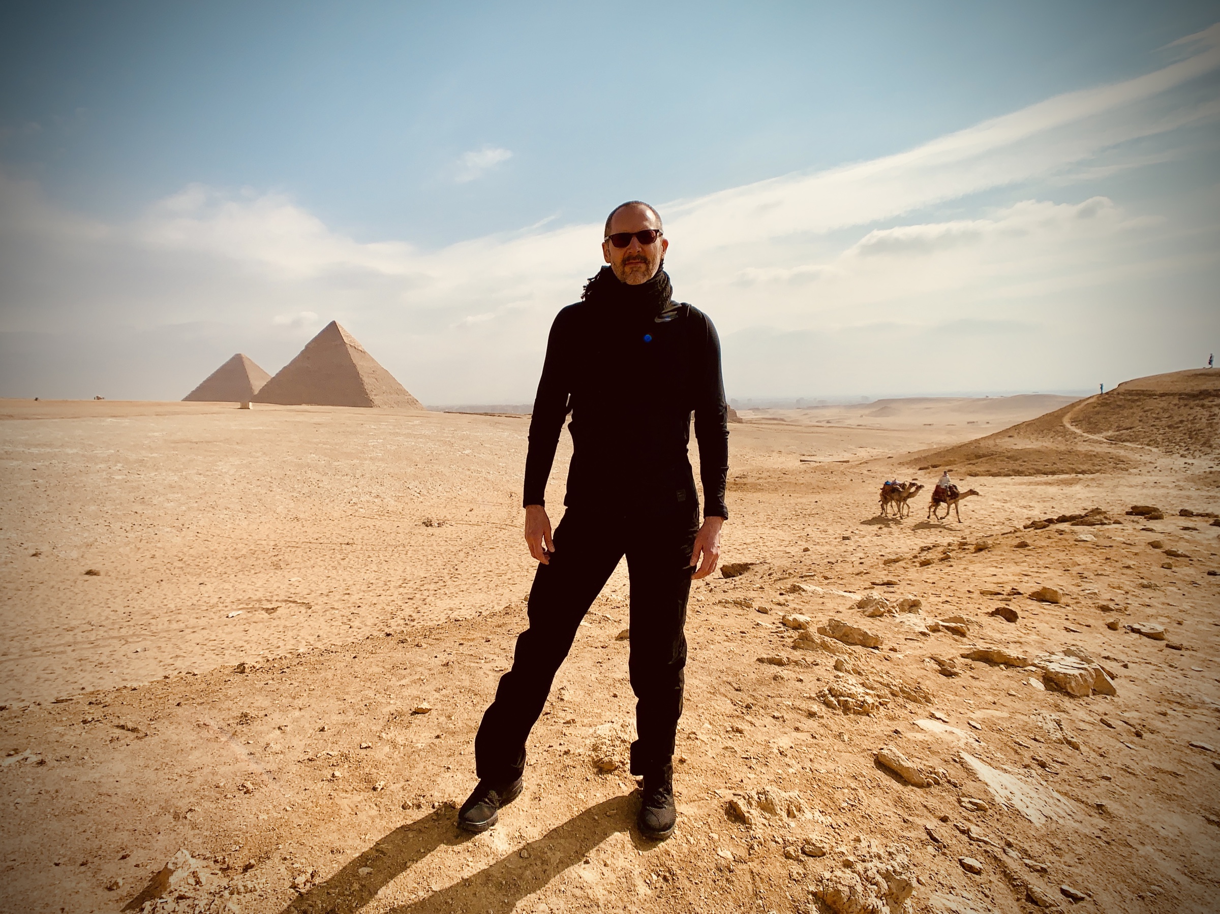 Steve Brazell standing near the pyramids of Giza