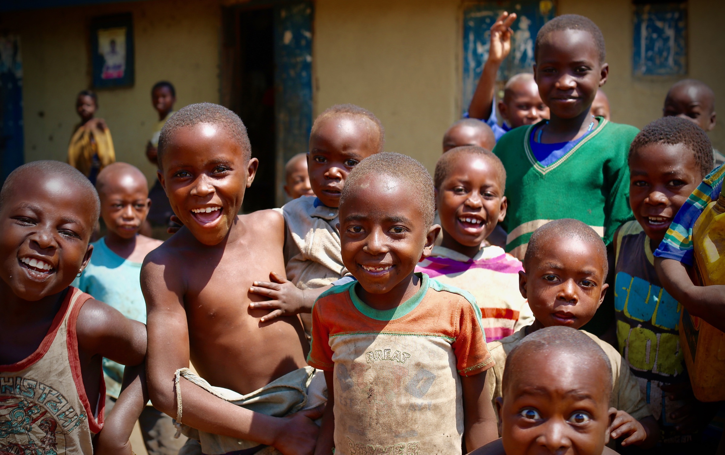 A joyful group of children gathered together in Uganda
